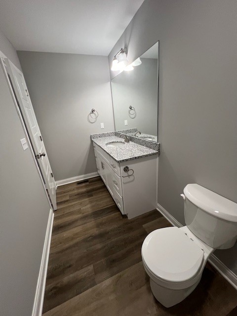 16 Cartertown Road, Unit B Scottsville, KY 42164 - Photo 12 of 15 a bathroom with a toilet sink and mirror