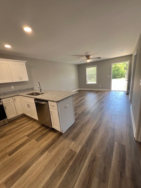 16 Cartertown Road, Unit B Scottsville, KY 42164 - Photo 4 of 15 a view of a kitchen with a sink and wooden floor