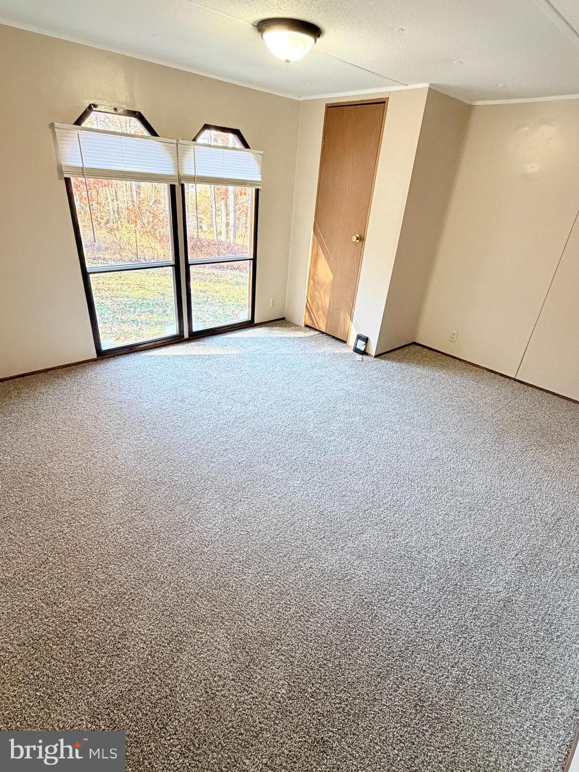 453 Upper Bailey Road Newport, PA 17074 - Photo 24 of 31 an empty room with windows and closet