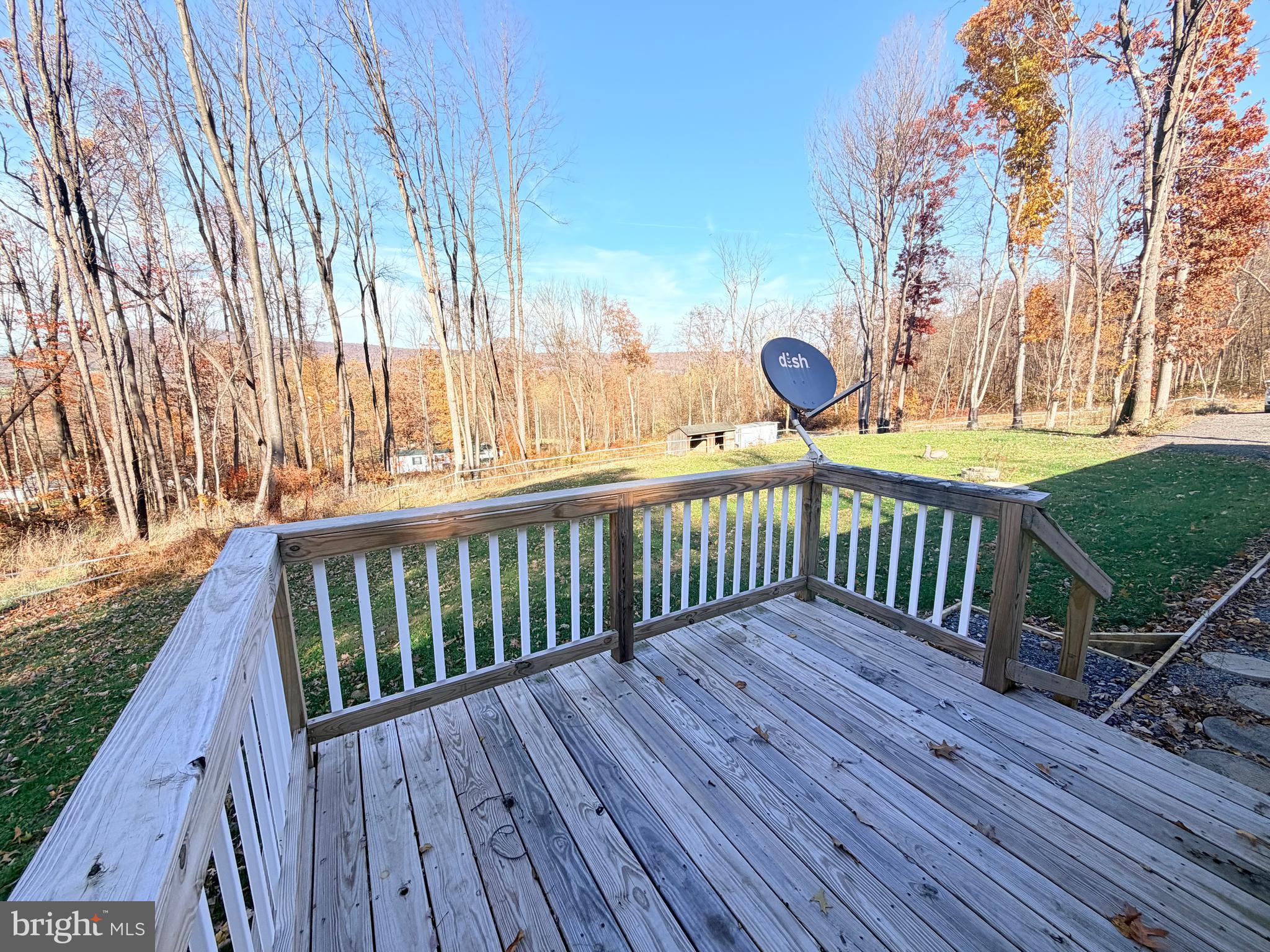 453 Upper Bailey Road Newport, PA 17074 - Photo 3 of 31 a view of a wooden deck with a yard