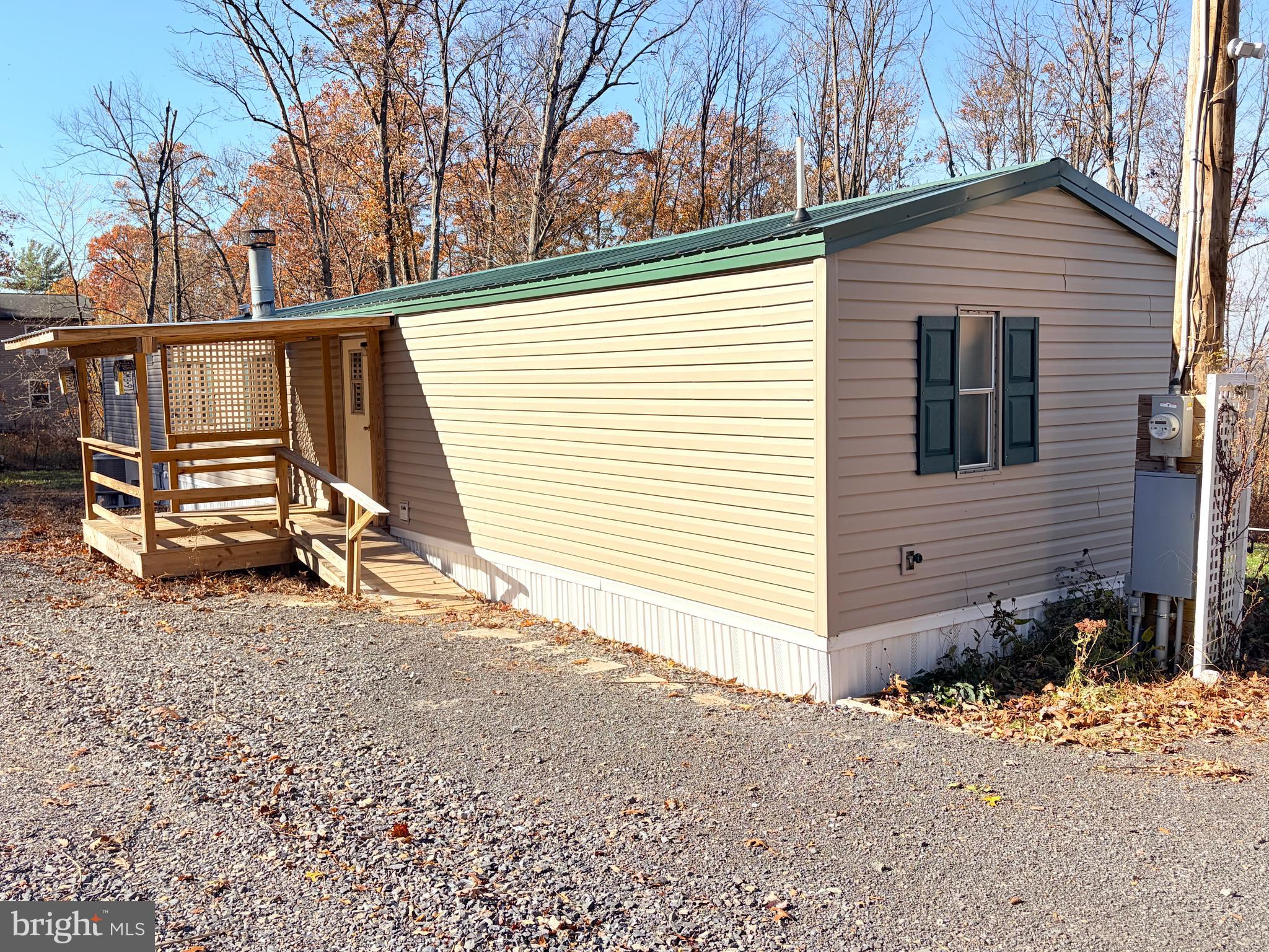 453 Upper Bailey Road Newport, PA 17074 - Photo 7 of 31 a view of a house with backyard and trees