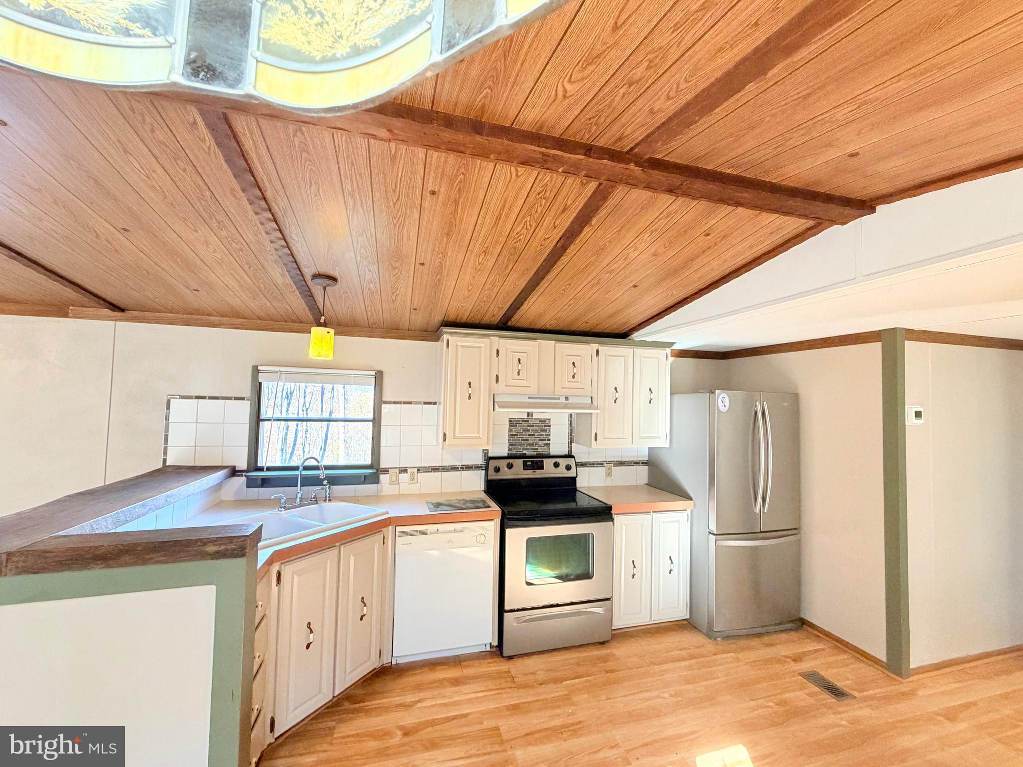 453 Upper Bailey Road Newport, PA 17074 - Photo 10 of 31 a kitchen with stainless steel appliances a refrigerator and a stove