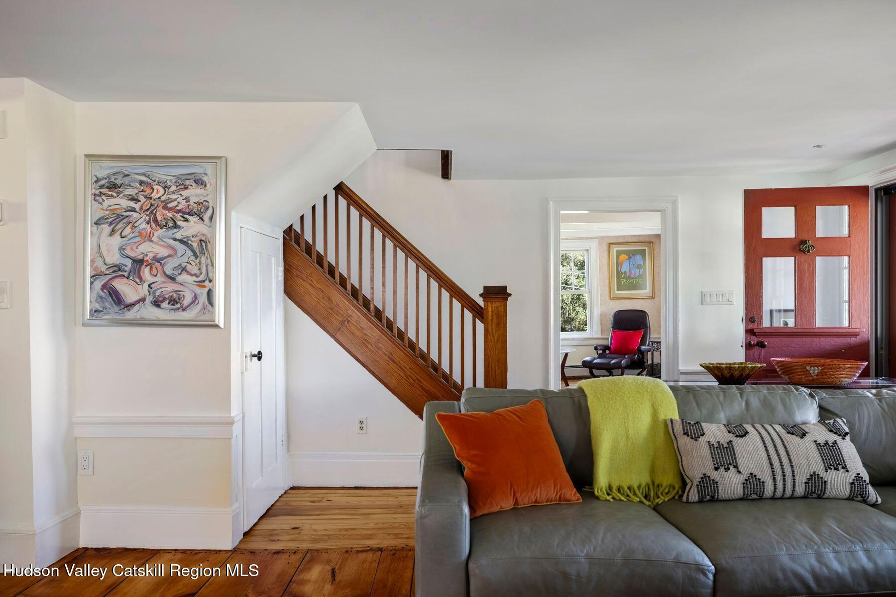 114 Chase Road Shokan, NY 12481 - Photo 11 of 68 a living room with furniture and stairs