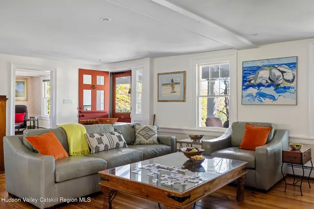 a kitchen with stainless steel appliances a stove a microwave and cabinets
