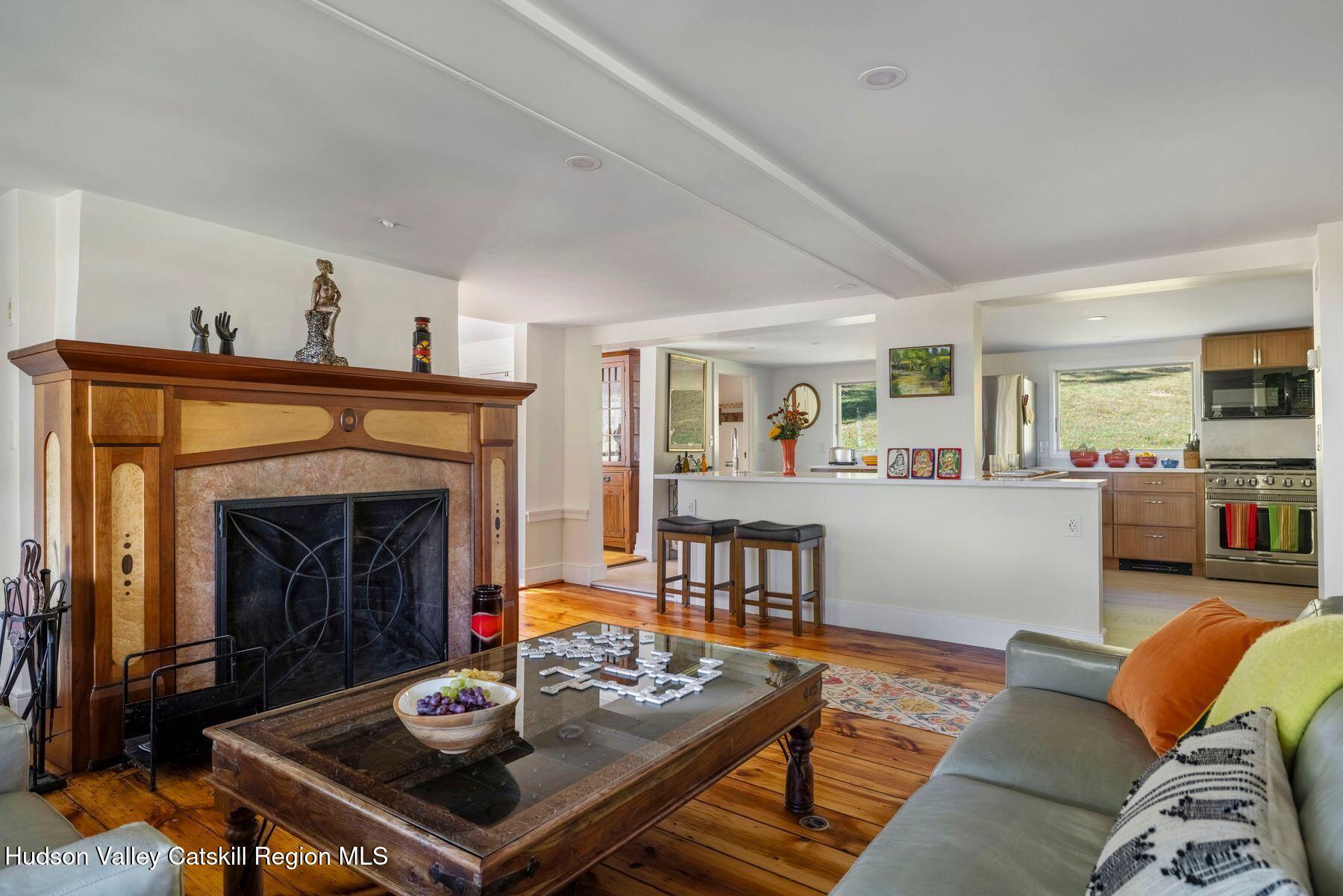 114 Chase Road Shokan, NY 12481 - Photo 15 of 68 a living room with furniture and a fireplace
