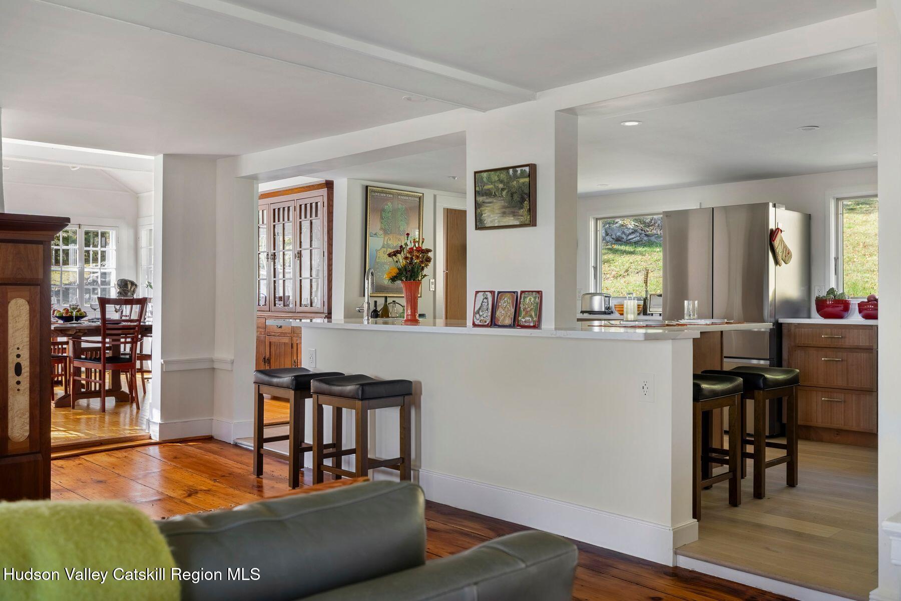 114 Chase Road Shokan, NY 12481 - Photo 16 of 68 a living room with furniture and wooden floor