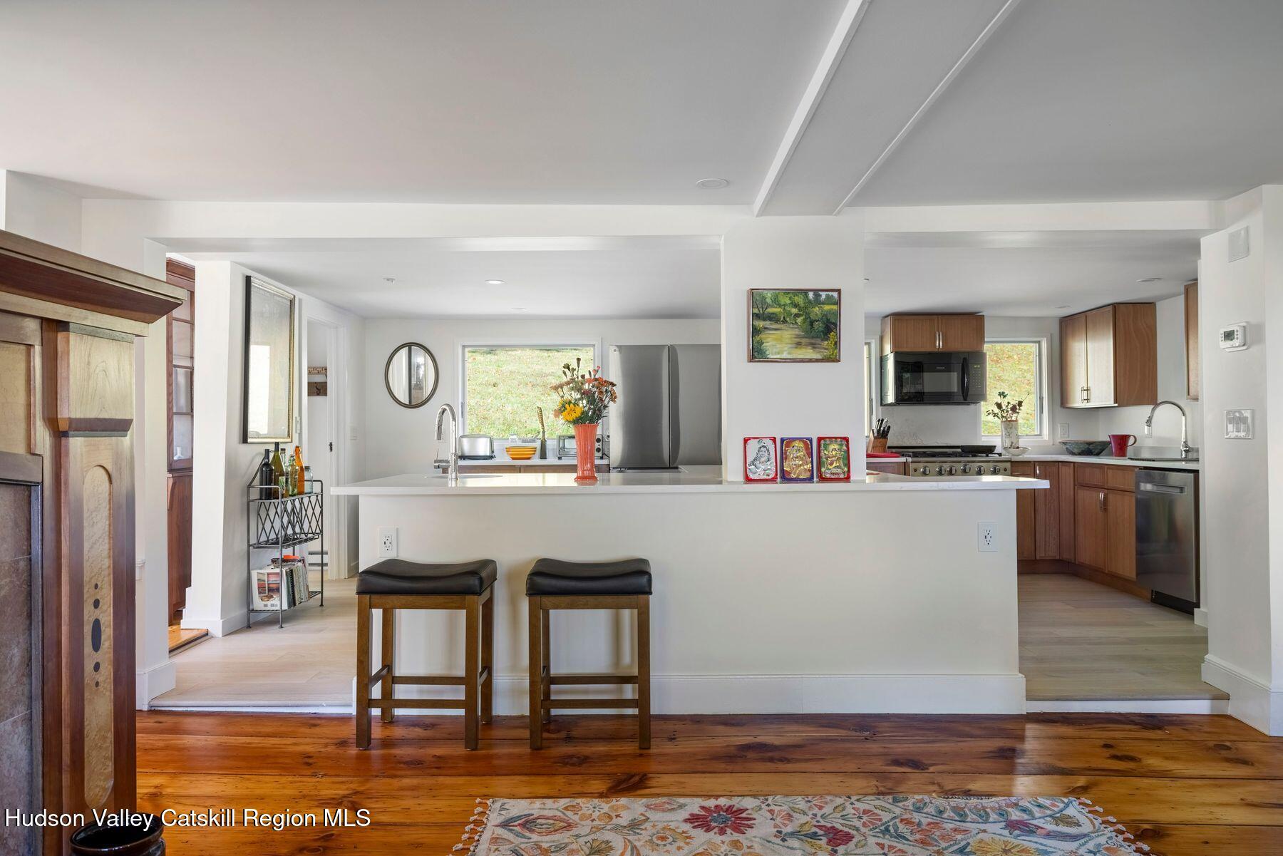 114 Chase Road Shokan, NY 12481 - Photo 23 of 68 a living room with furniture and a wooden floor