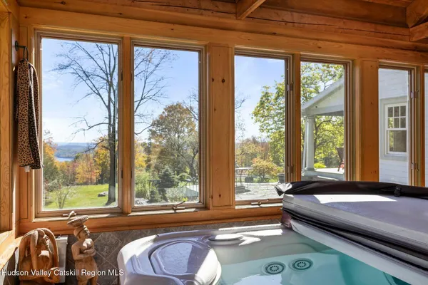 a room with a window and chair