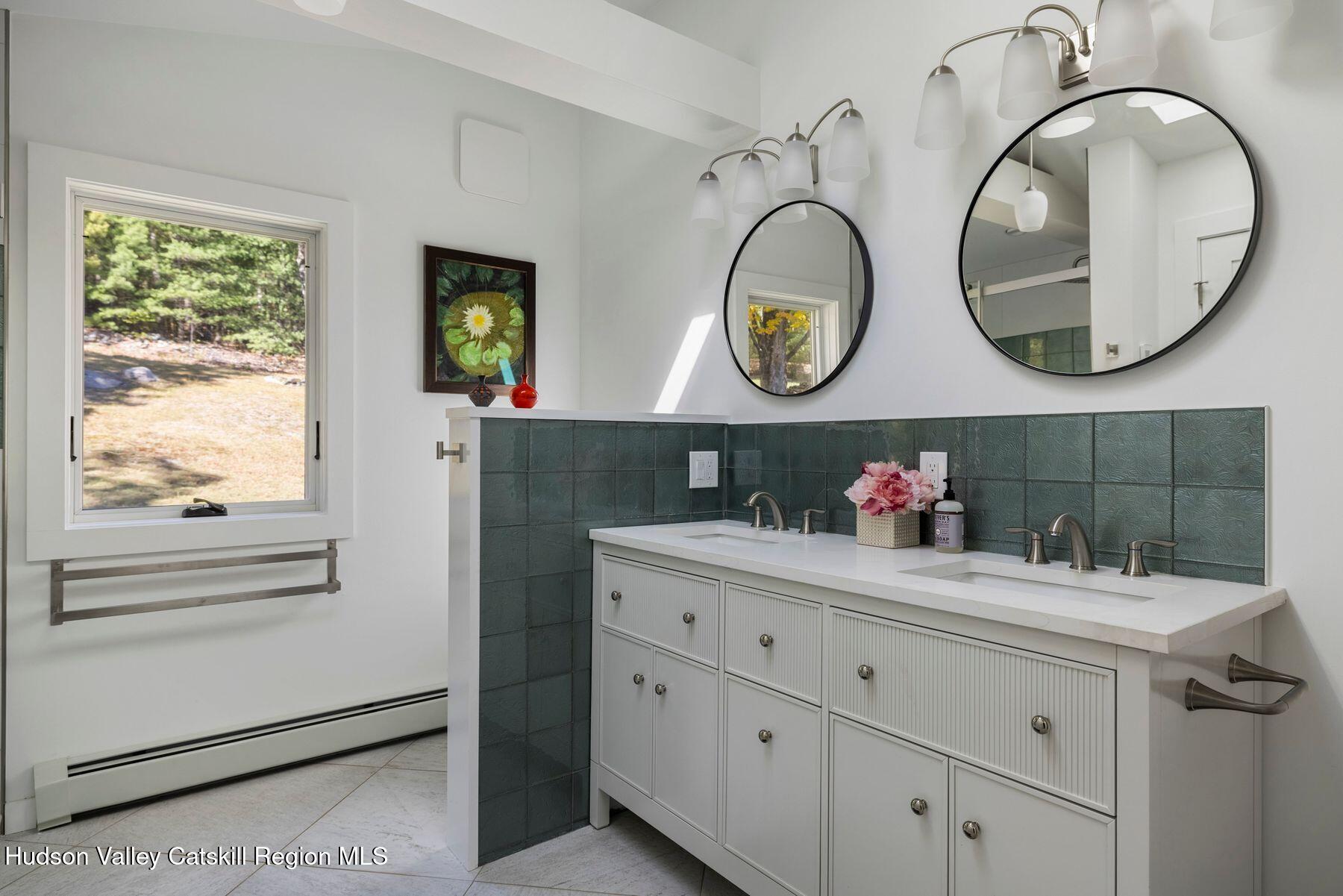 114 Chase Road Shokan, NY 12481 - Photo 39 of 68 a bathroom with a sink and a mirror