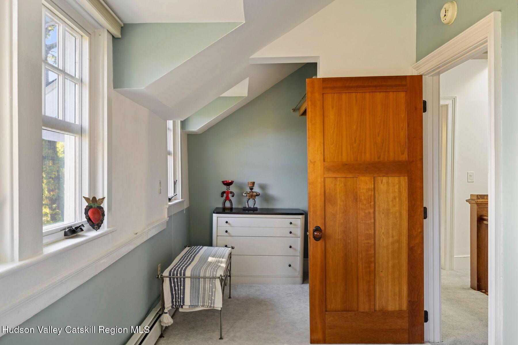 114 Chase Road Shokan, NY 12481 - Photo 42 of 68 a room with a window and chair