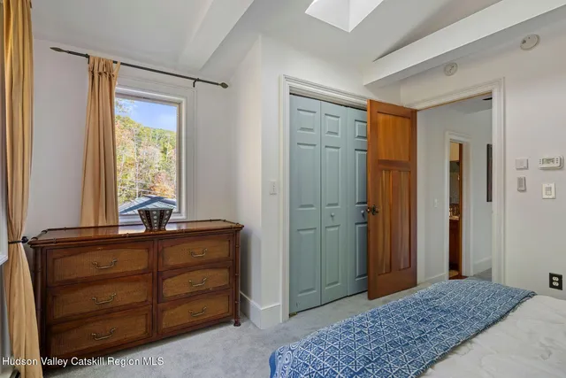 a bathroom with a shower and toilet