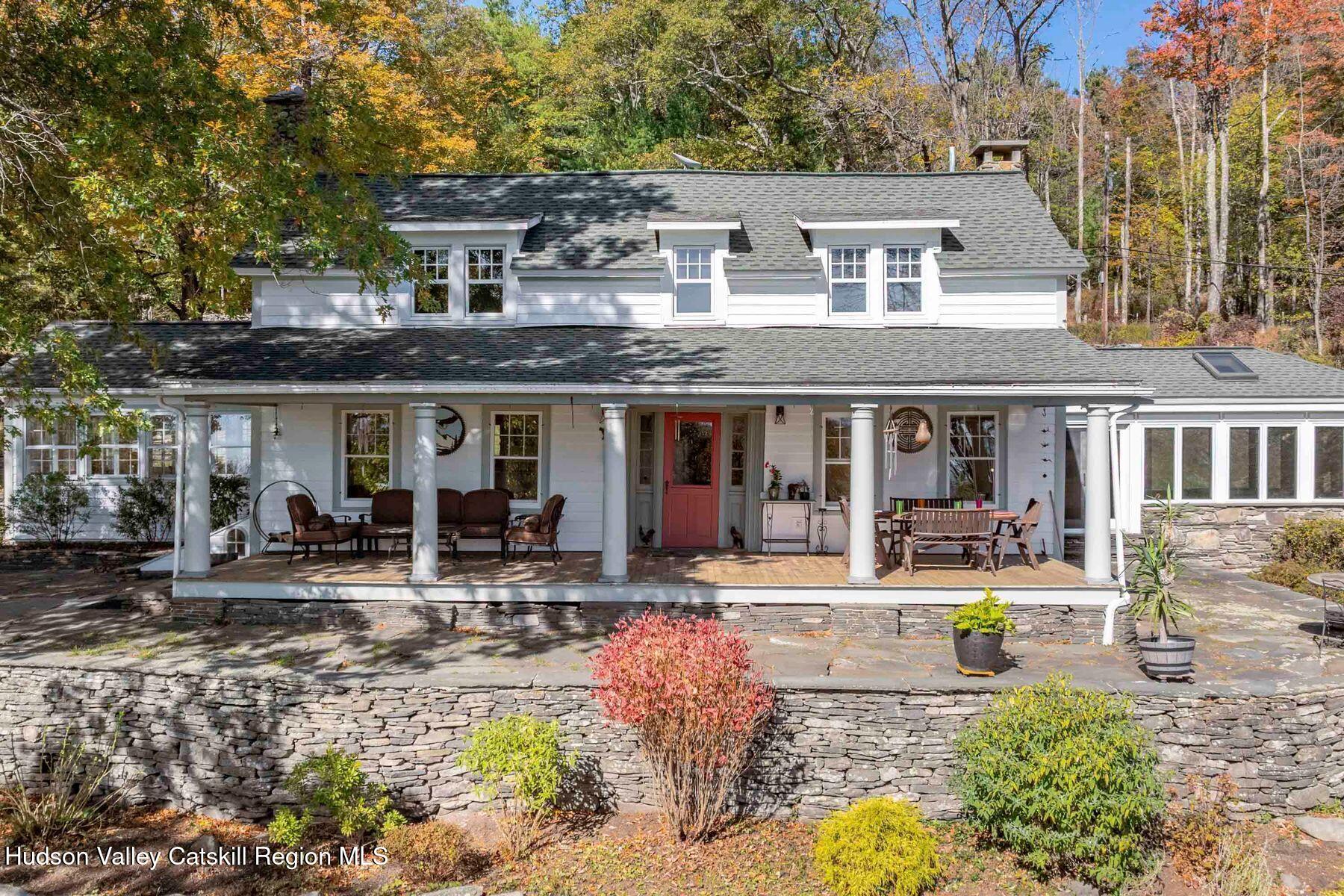114 Chase Road Shokan, NY 12481 - Photo 54 of 68 a front view of a house with swimming pool and sitting area