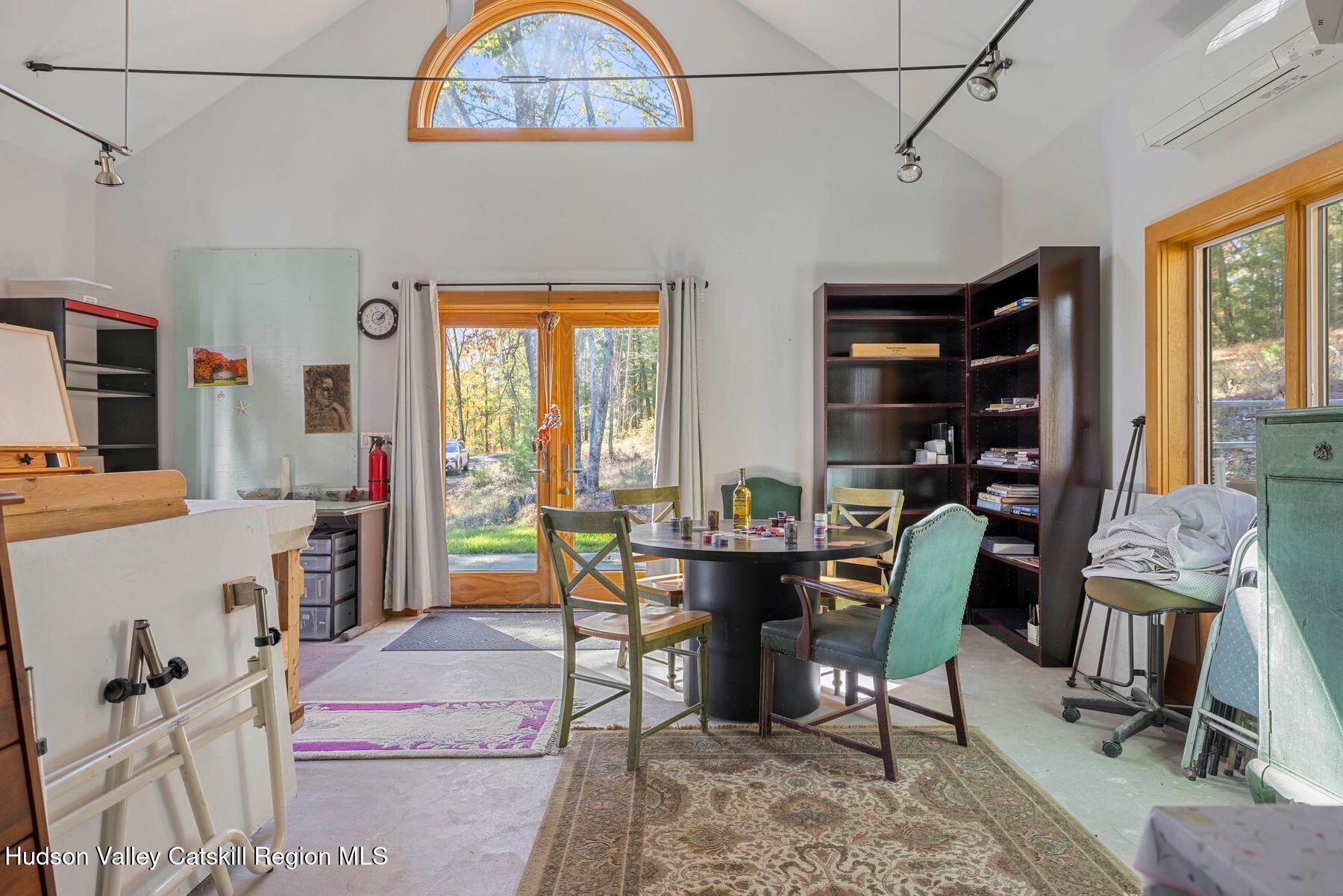 114 Chase Road Shokan, NY 12481 - Photo 58 of 68 a view of a workspace with furniture and a window