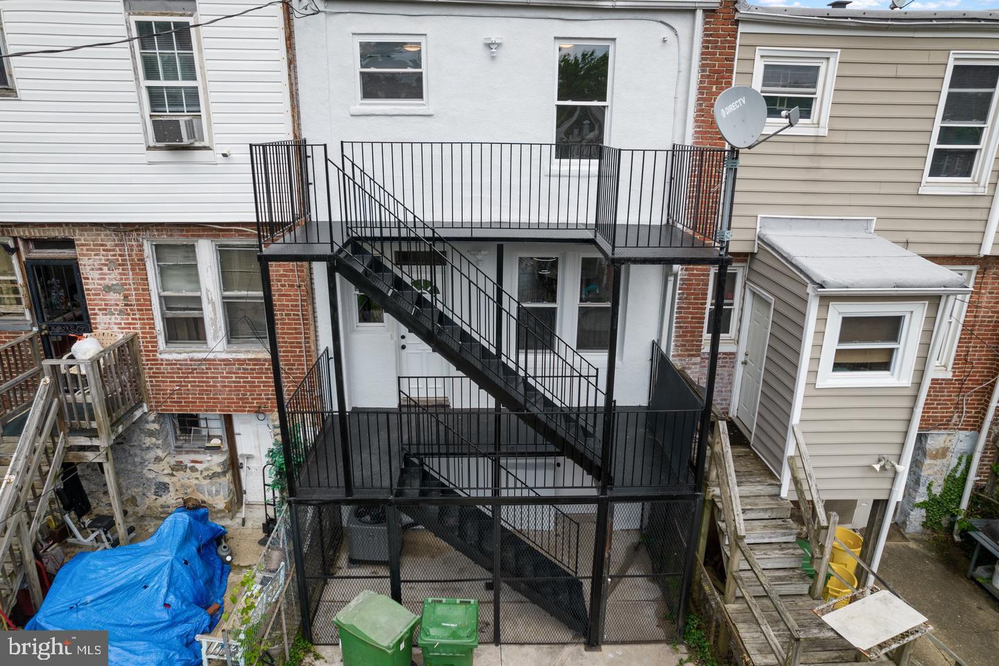 4206 Reisterstown Road Baltimore, MD 21215 - Photo 12 of 14 a view of a house with backyard and deck