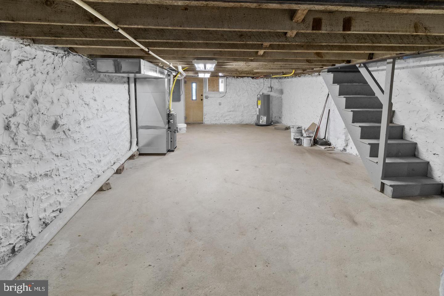 4206 Reisterstown Road Baltimore, MD 21215 - Photo 2 of 14 a view of empty room with wooden walls