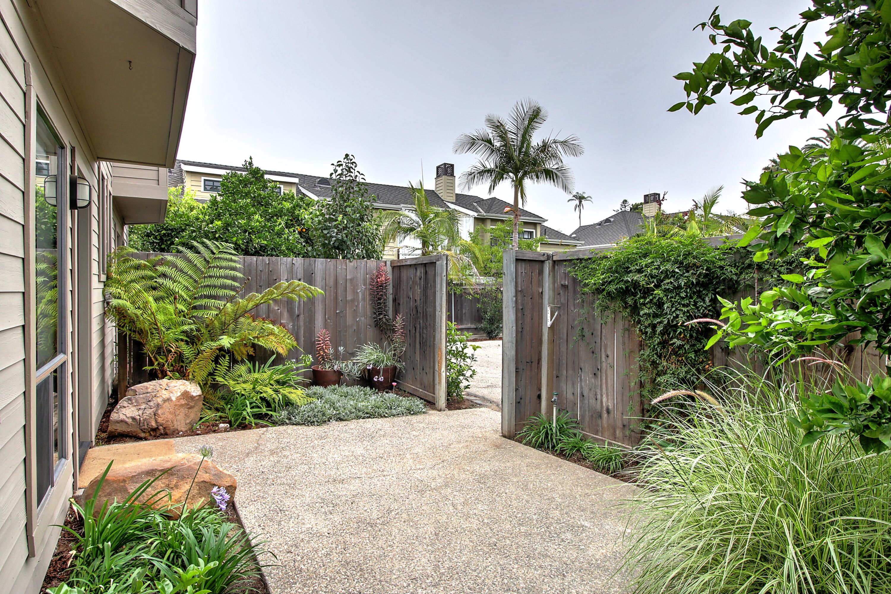 1624 Bath Street, Unit B Santa Barbara, CA 93101 - Photo 2 of 16 a backyard of a house with lots of green space