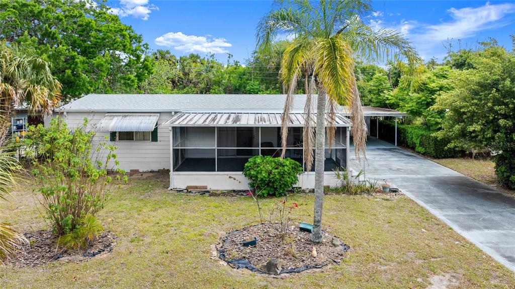 a front view of a house with yard
