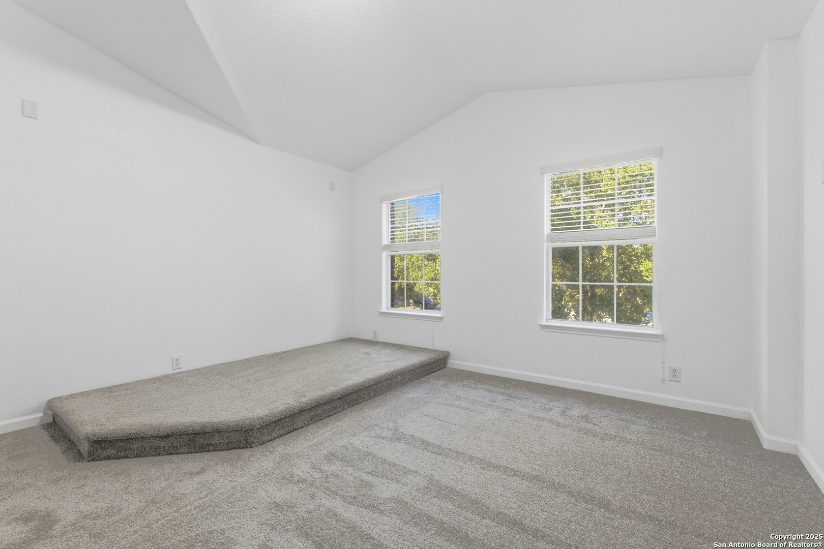 105 Lookout View Cibolo, TX 78108 - Photo 13 of 26 an empty room with a window