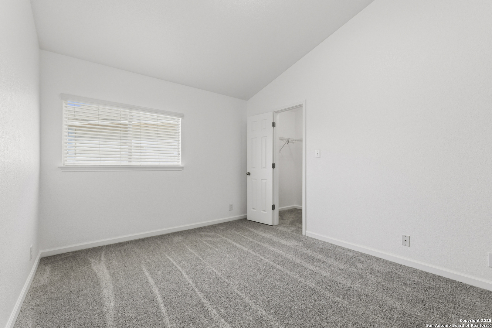105 Lookout View Cibolo, TX 78108 - Photo 17 of 26 a view of an empty room with a window