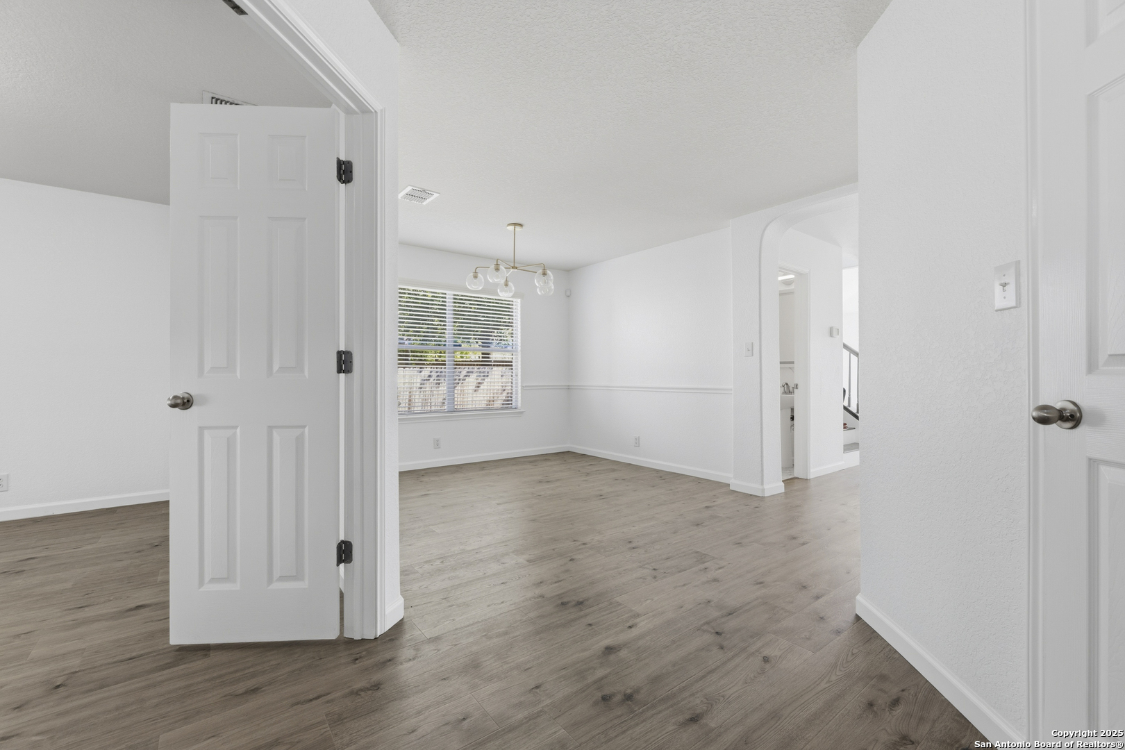 105 Lookout View Cibolo, TX 78108 - Photo 9 of 26 a view of a room with wooden floor