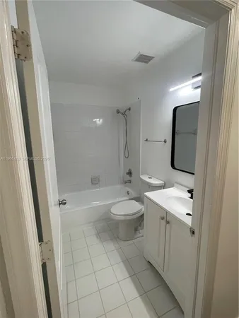 a view of a swimming pool with a lounge chairs