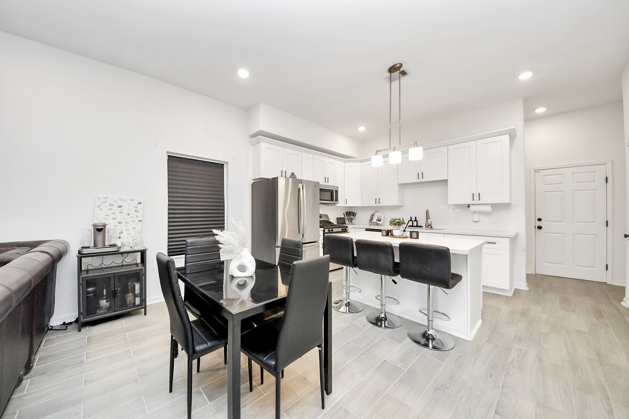 4613 Ireland Street, Unit B Houston, TX 77016 - Photo 17 of 39 a view of a dining room with furniture