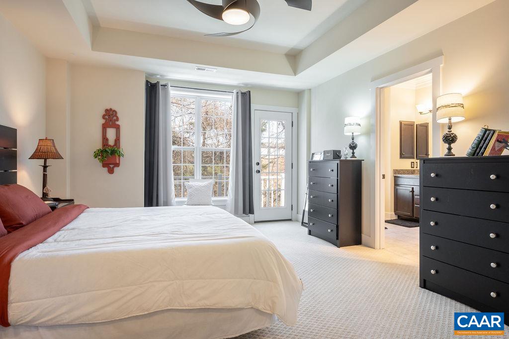 2052 Avinity Loop Charlottesville, VA 22902 - Photo 12 of 39 a bedroom with a bed and large window