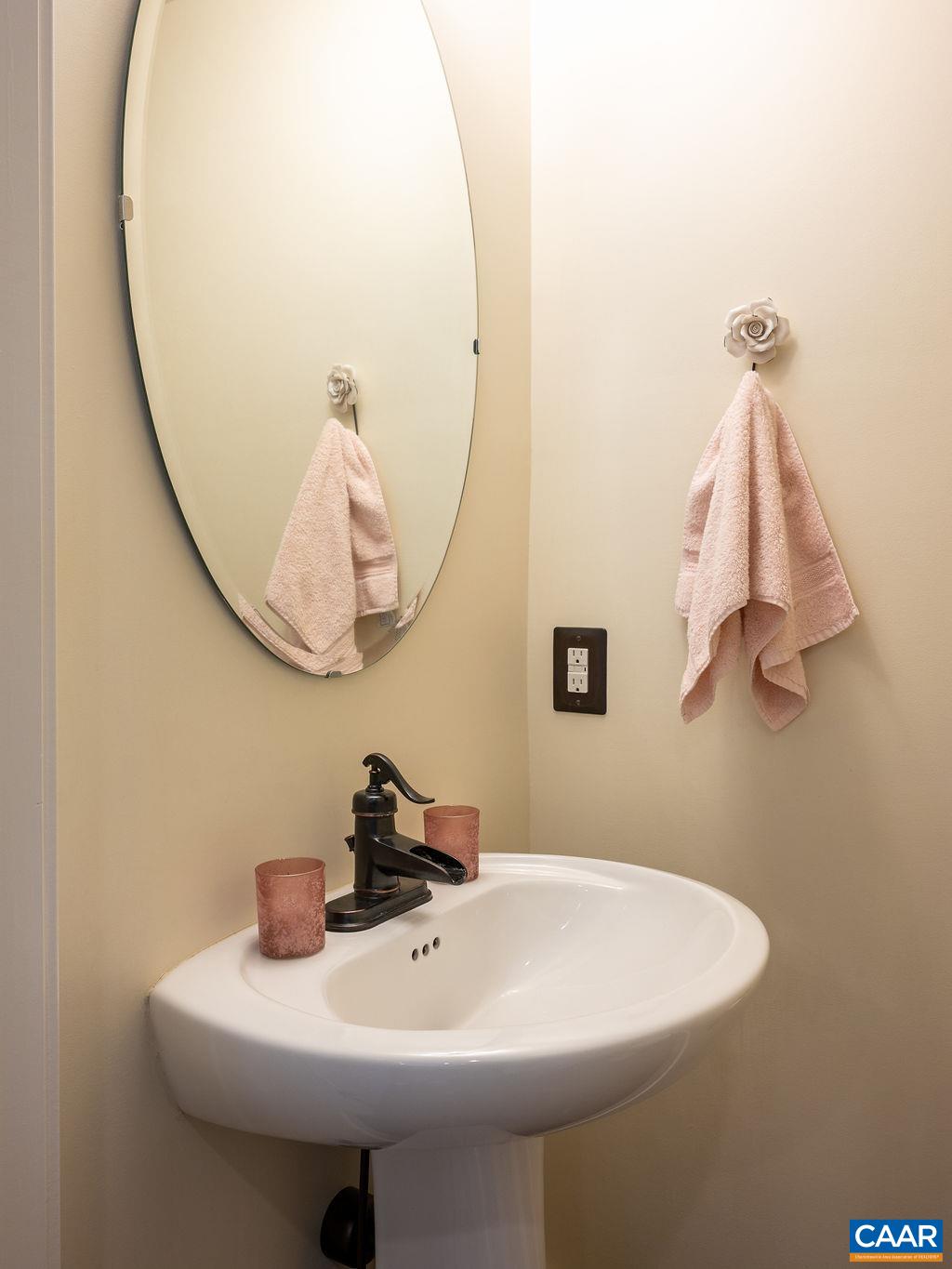 2052 Avinity Loop Charlottesville, VA 22902 - Photo 16 of 39 a bathroom with a sink and mirror