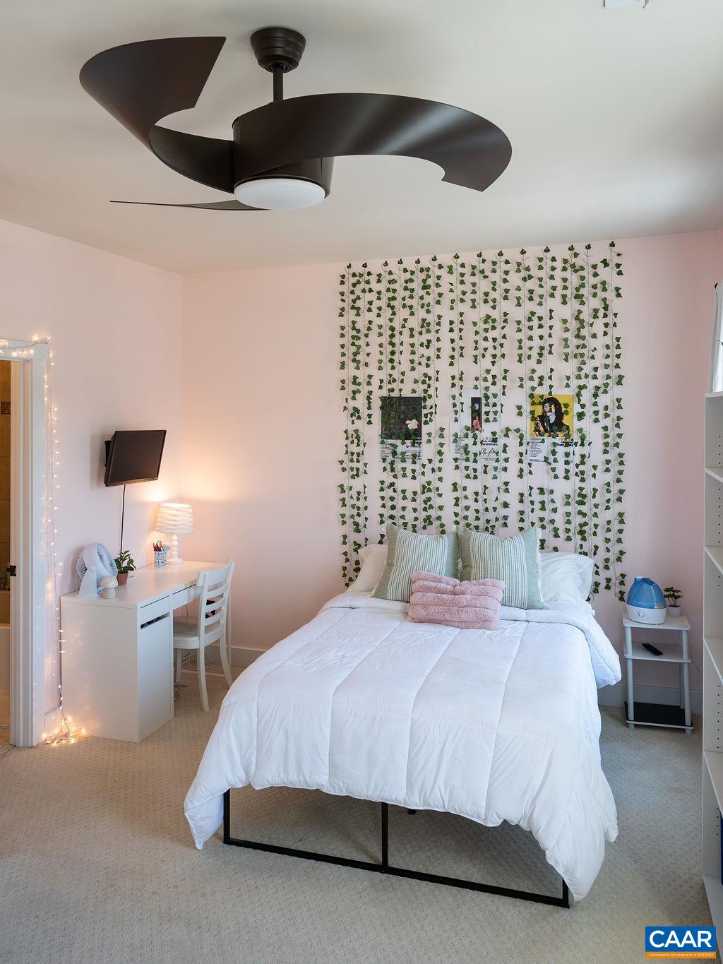 2052 Avinity Loop Charlottesville, VA 22902 - Photo 17 of 39 a bedroom with a bed and a lamp on the dresser