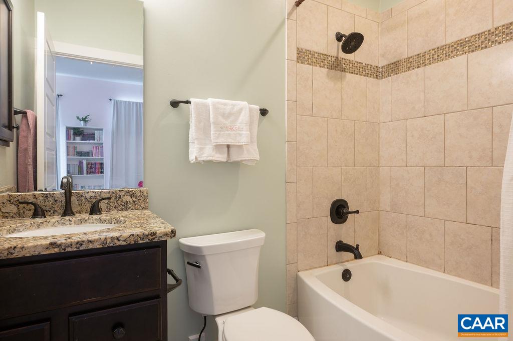 2052 Avinity Loop Charlottesville, VA 22902 - Photo 20 of 39 a bathroom with a sink and a mirror
