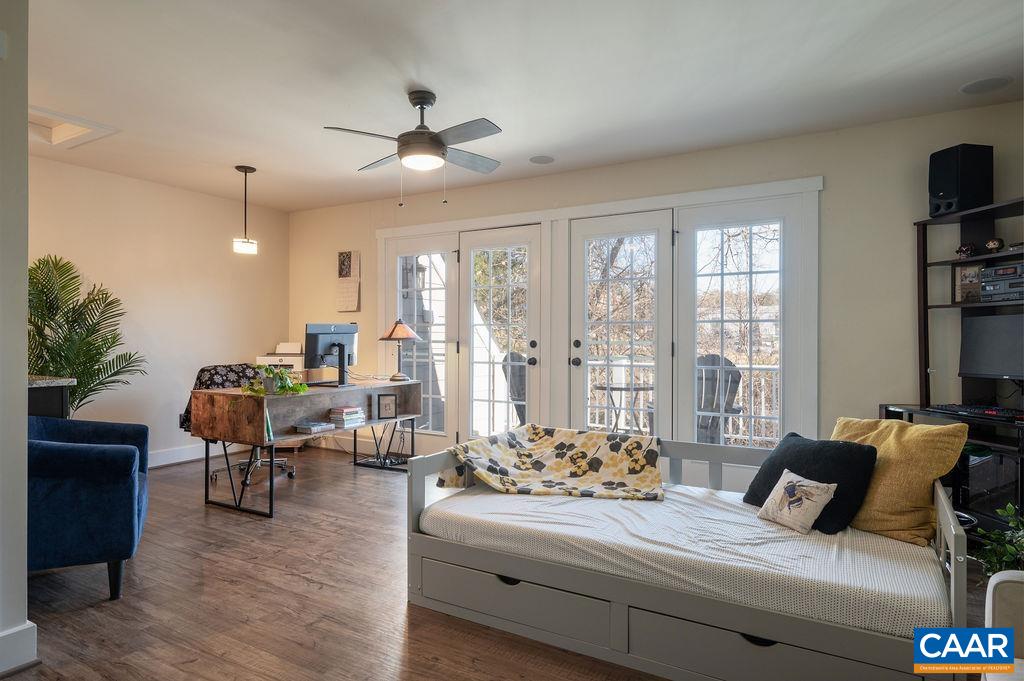 2052 Avinity Loop Charlottesville, VA 22902 - Photo 22 of 39 a bedroom with furniture and large windows