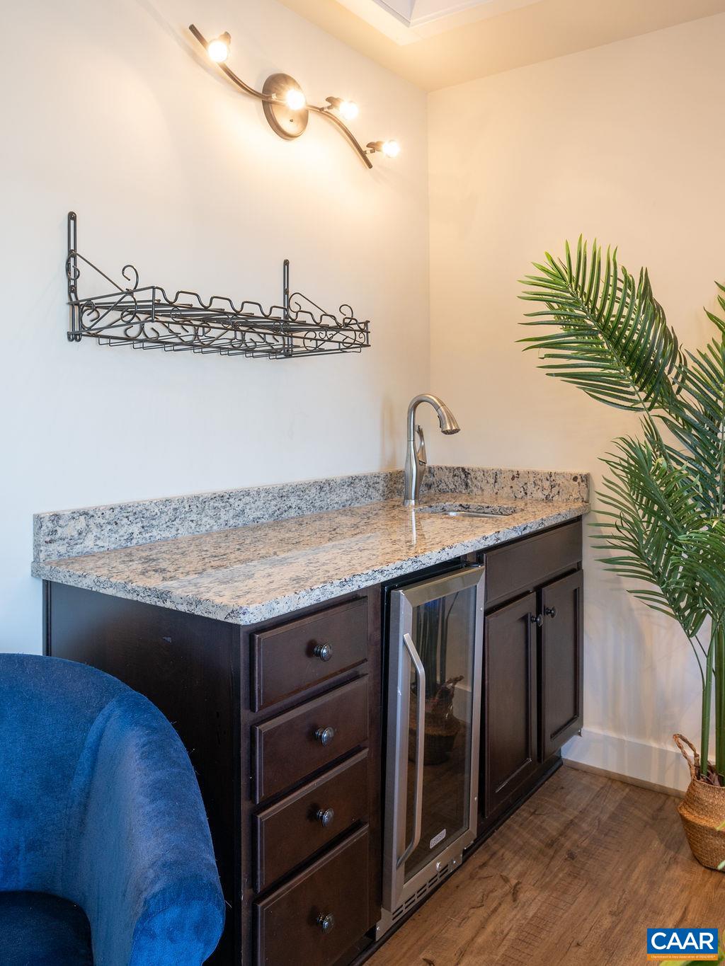 2052 Avinity Loop Charlottesville, VA 22902 - Photo 24 of 39 a kitchen with a sink and cabinets