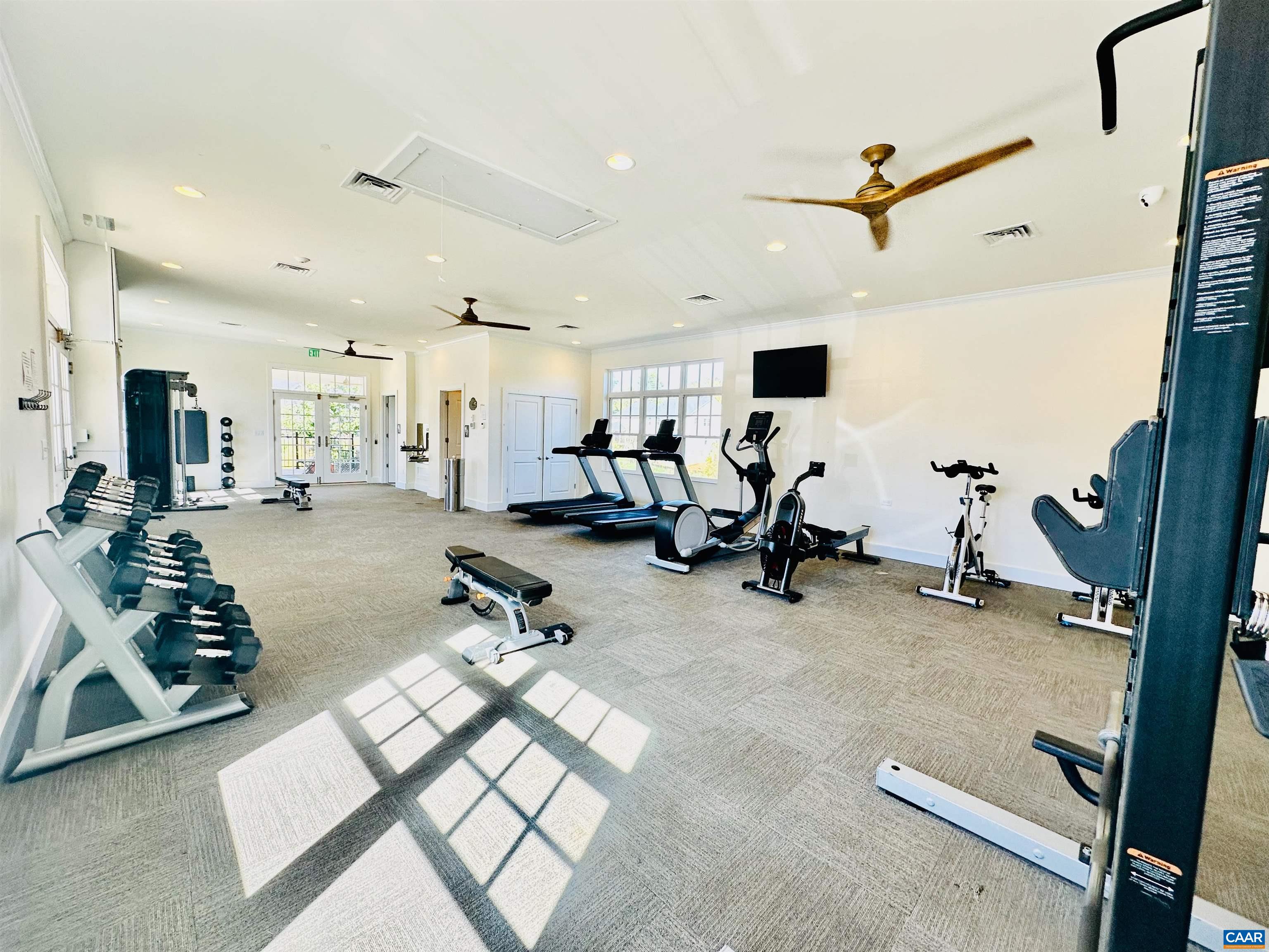 2052 Avinity Loop Charlottesville, VA 22902 - Photo 34 of 39 a view of a room with gym equipment