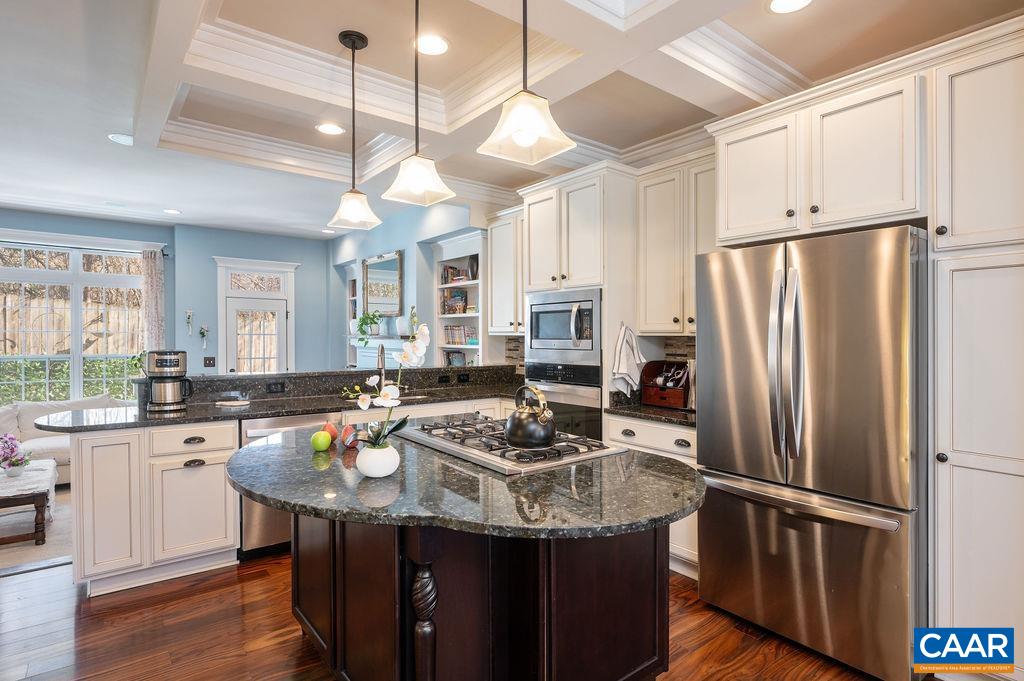 2052 Avinity Loop Charlottesville, VA 22902 - Photo 6 of 39 a kitchen with stainless steel appliances granite countertop a sink stove and refrigerator