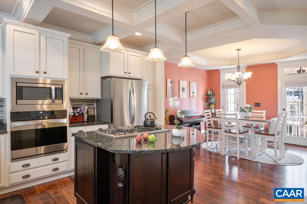 2052 Avinity Loop Charlottesville, VA 22902 - Photo 7 of 39 a kitchen with stainless steel appliances granite countertop a stove and refrigerator