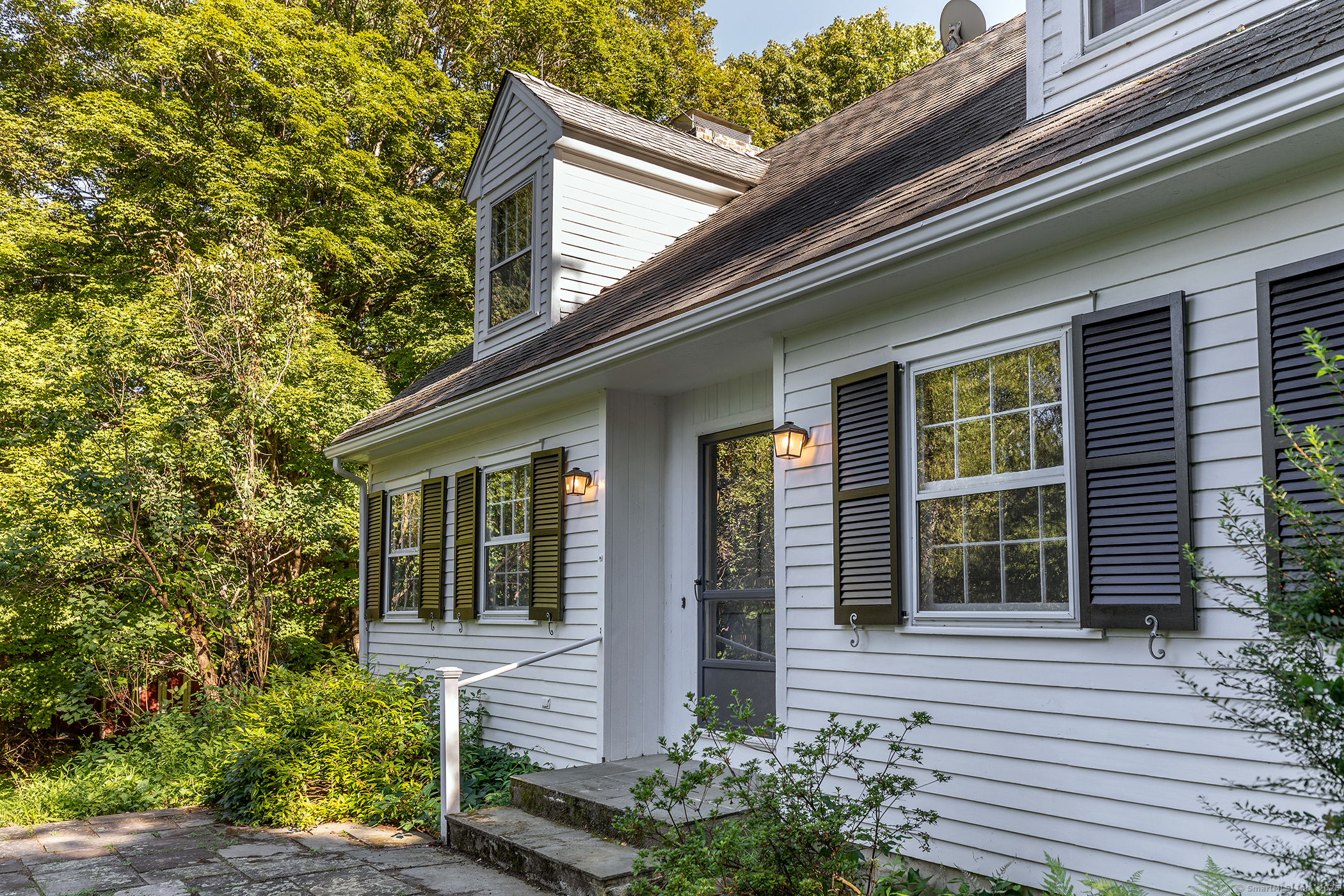 242 Tophet Road Roxbury, CT 06783 - Photo 13 of 25 a front view of a house with garden