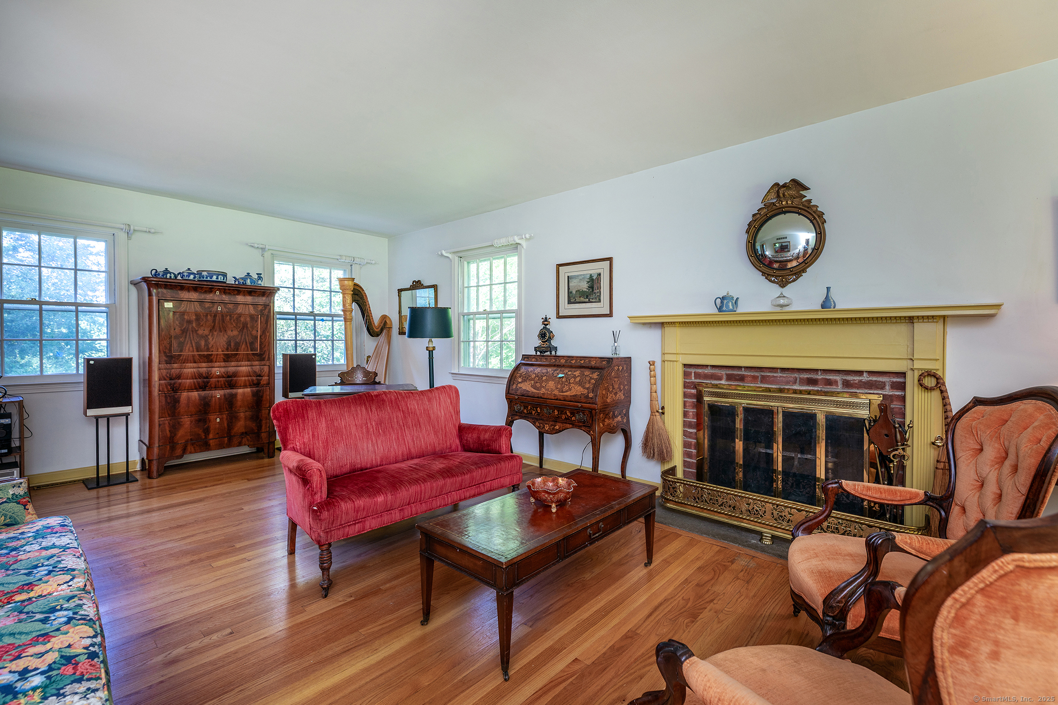 242 Tophet Road Roxbury, CT 06783 - Photo 15 of 25 a living room with furniture and a fireplace