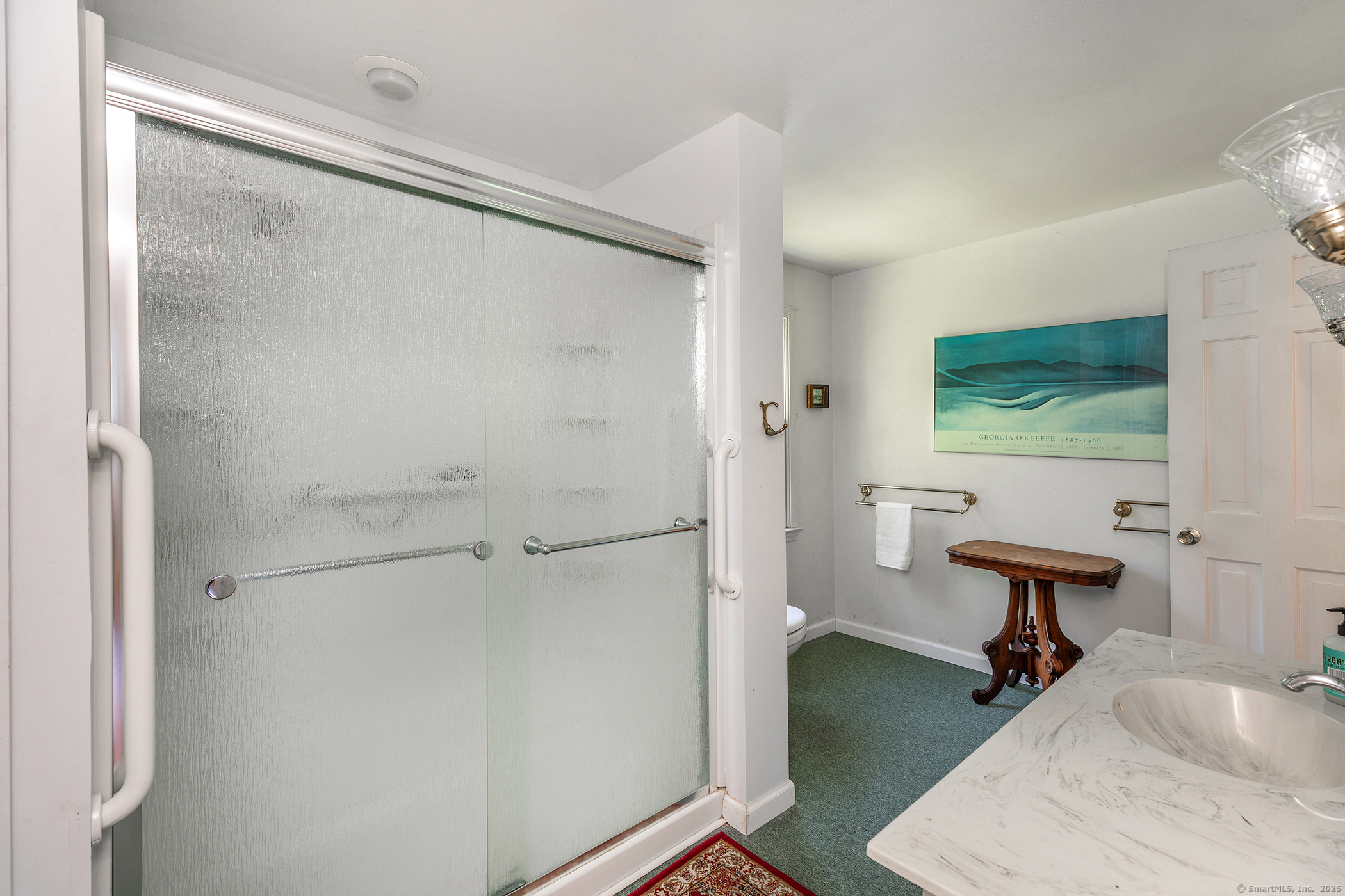242 Tophet Road Roxbury, CT 06783 - Photo 22 of 25 a bathroom with a sink and a mirror