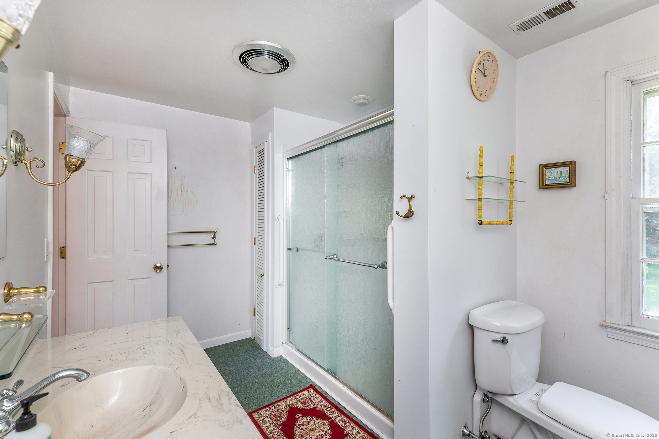 242 Tophet Road Roxbury, CT 06783 - Photo 23 of 25 a bathroom with a sink toilet and shower