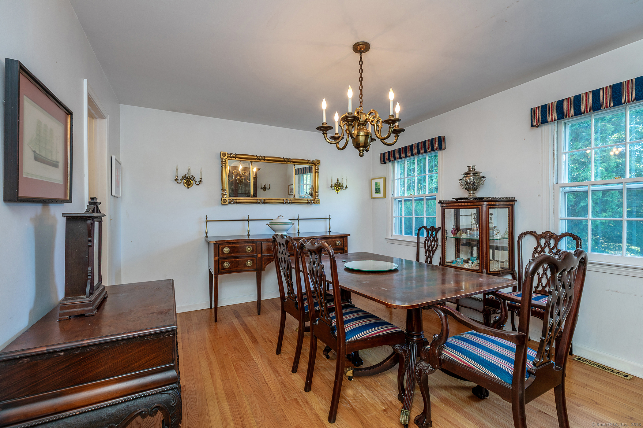 242 Tophet Road Roxbury, CT 06783 - Photo 5 of 25 a view of a dining room with furniture and chandelier