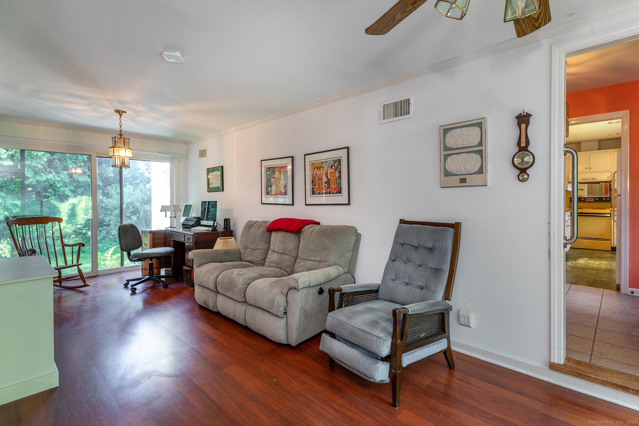 242 Tophet Road Roxbury, CT 06783 - Photo 8 of 25 a living room with furniture and a large window