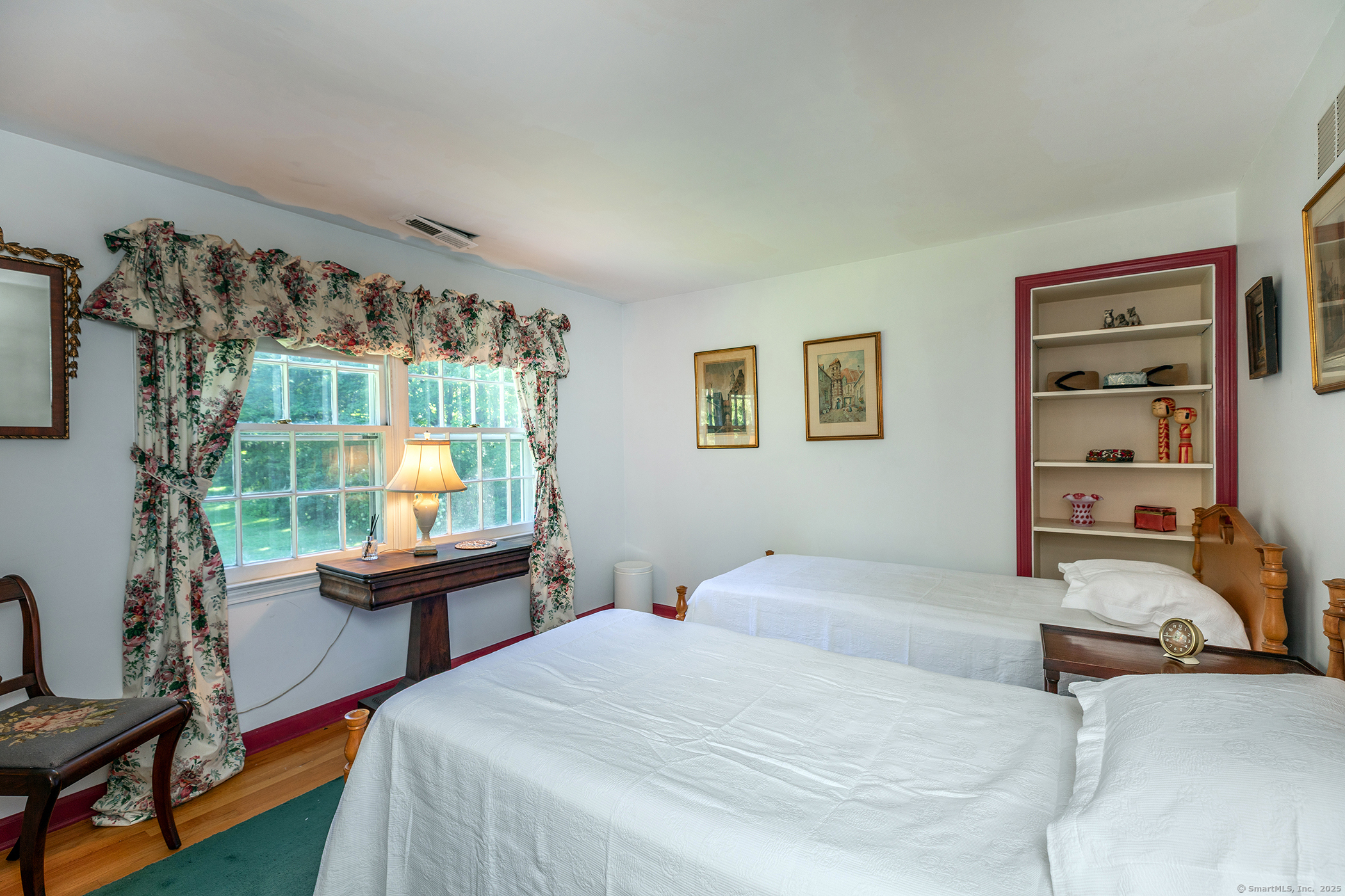 242 Tophet Road Roxbury, CT 06783 - Photo 9 of 25 a bedroom with a bed and a window