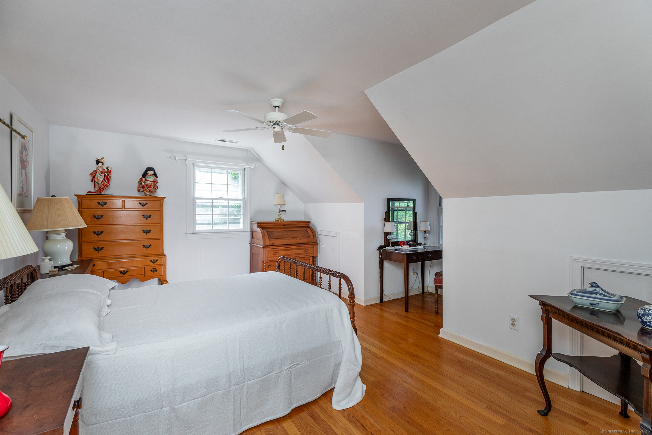 242 Tophet Road Roxbury, CT 06783 - Photo 10 of 25 a bedroom with furniture and a wooden floor