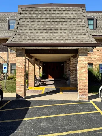 a view of building with glass windows