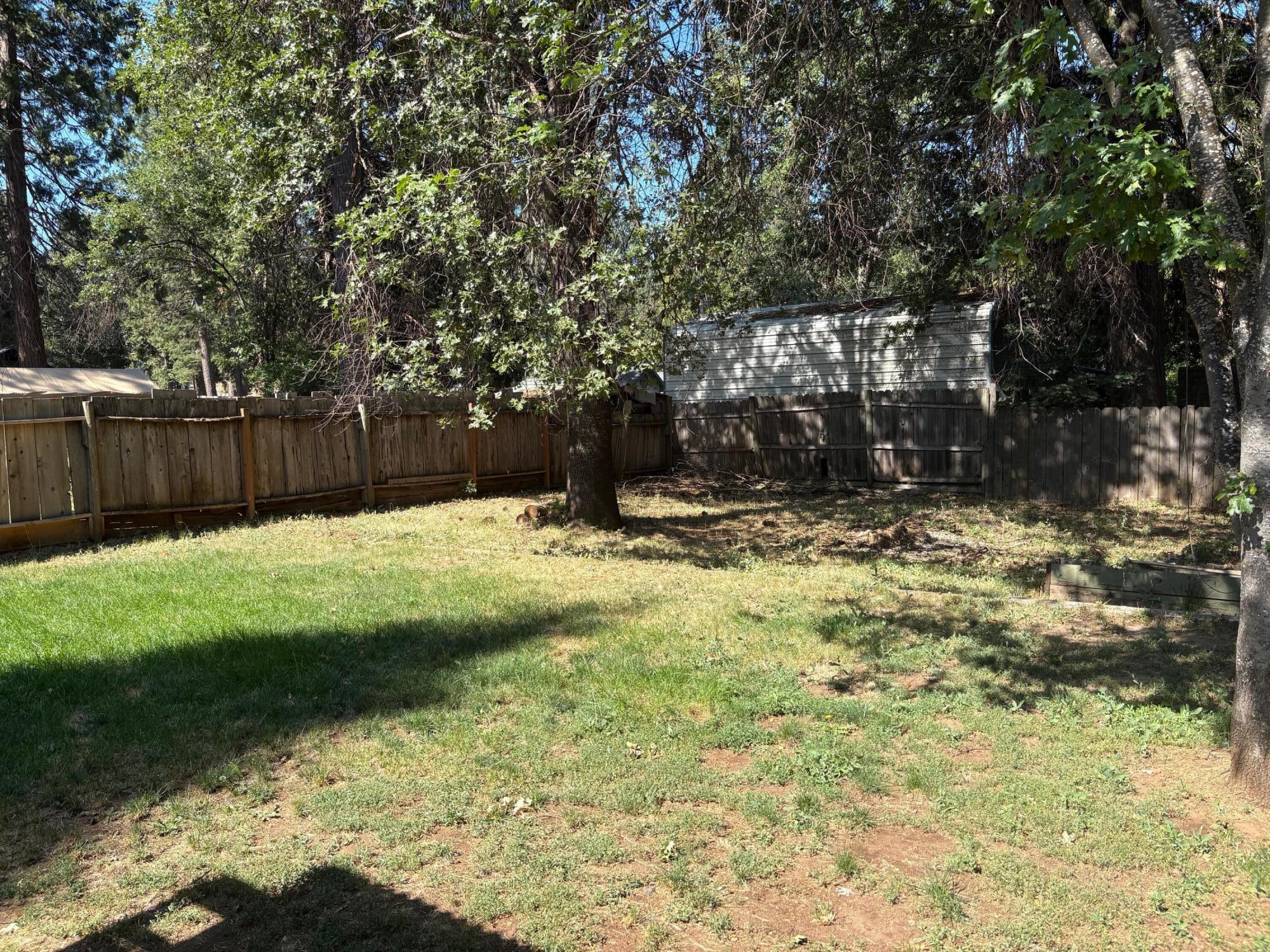 20194 Sugar Pine Street Burney, CA 96013 - Photo 5 of 15 a view of swimming pool next to a yard