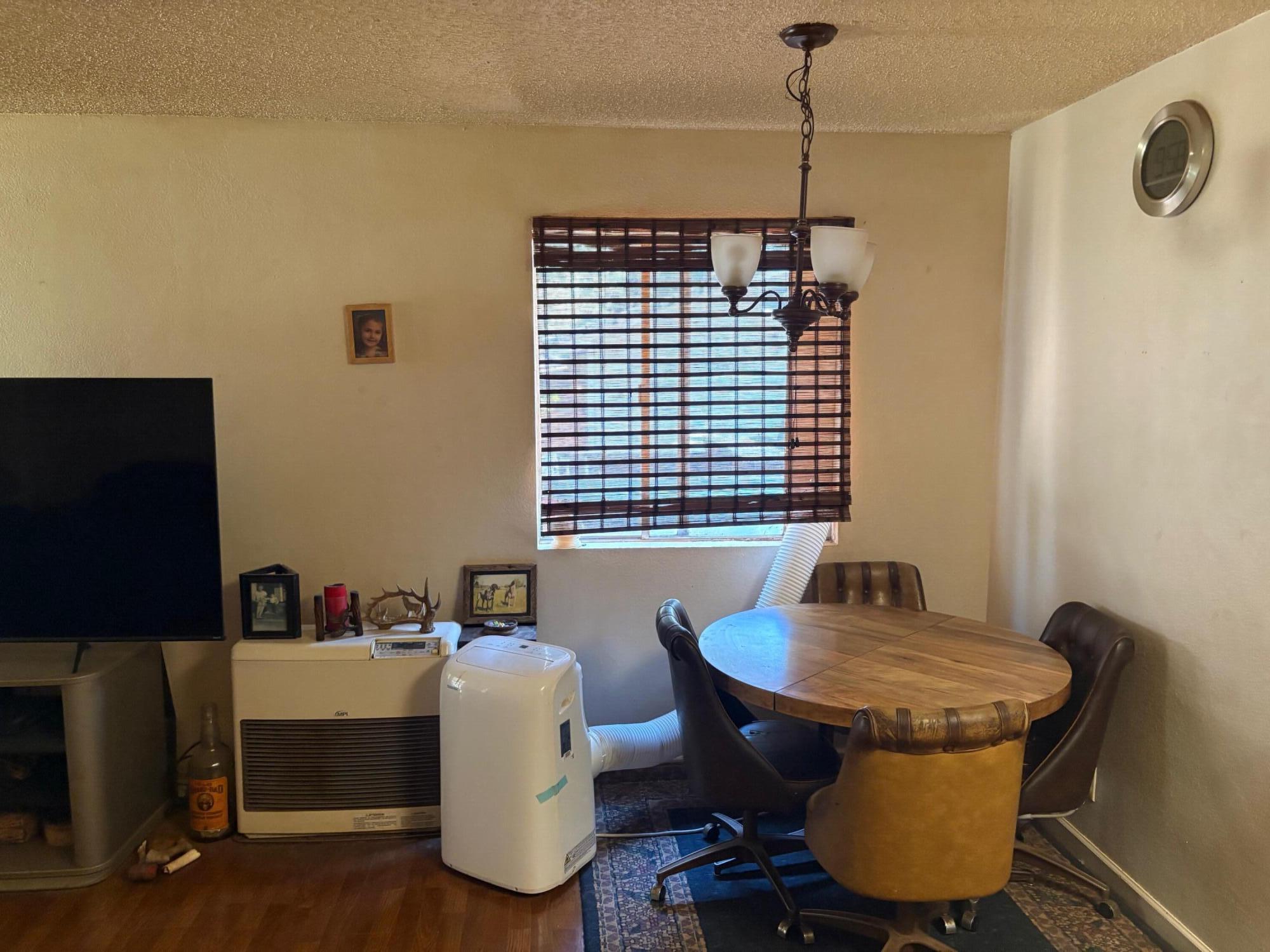 20194 Sugar Pine Street Burney, CA 96013 - Photo 10 of 15 a living room with furniture and a window