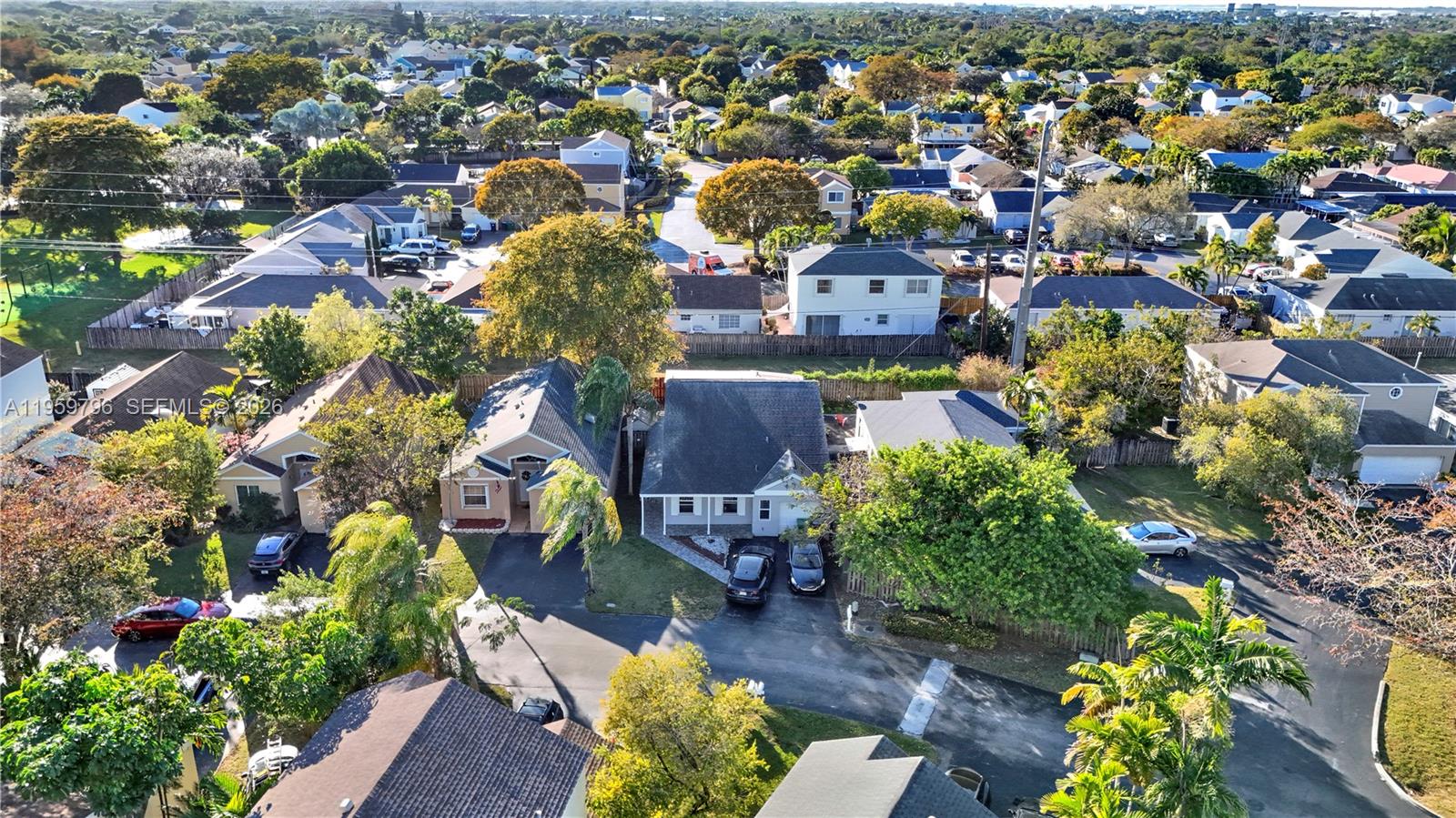 14600 Southwest 124th Place Miami, FL 33186 - Photo 31 of 34 an aerial view of a houses with yard
