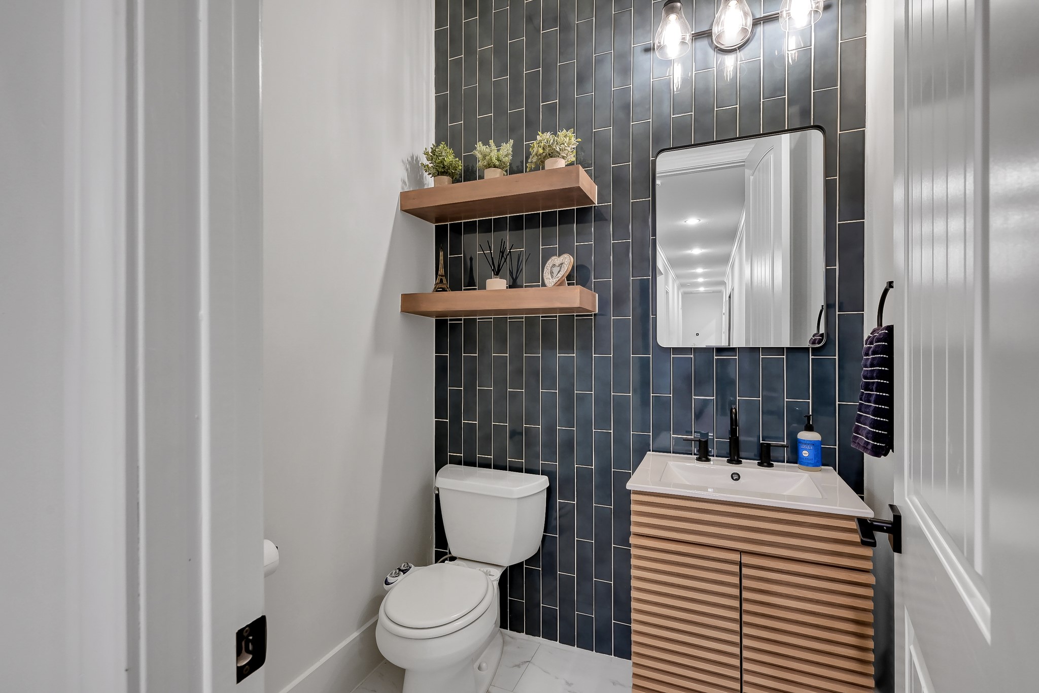 15937 Stagecoach Road Stagecoach, TX 77355 - Photo 19 of 50 a bathroom with a sink toilet and shower