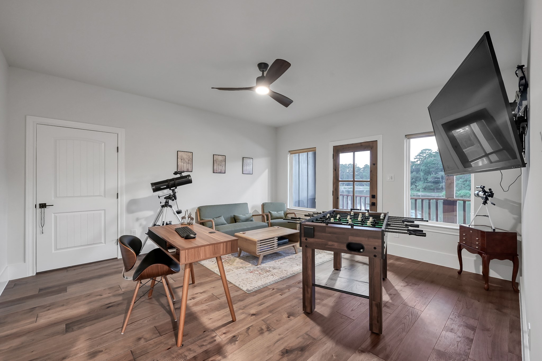 15937 Stagecoach Road Stagecoach, TX 77355 - Photo 34 of 50 a workspace with furniture window and wooden floor