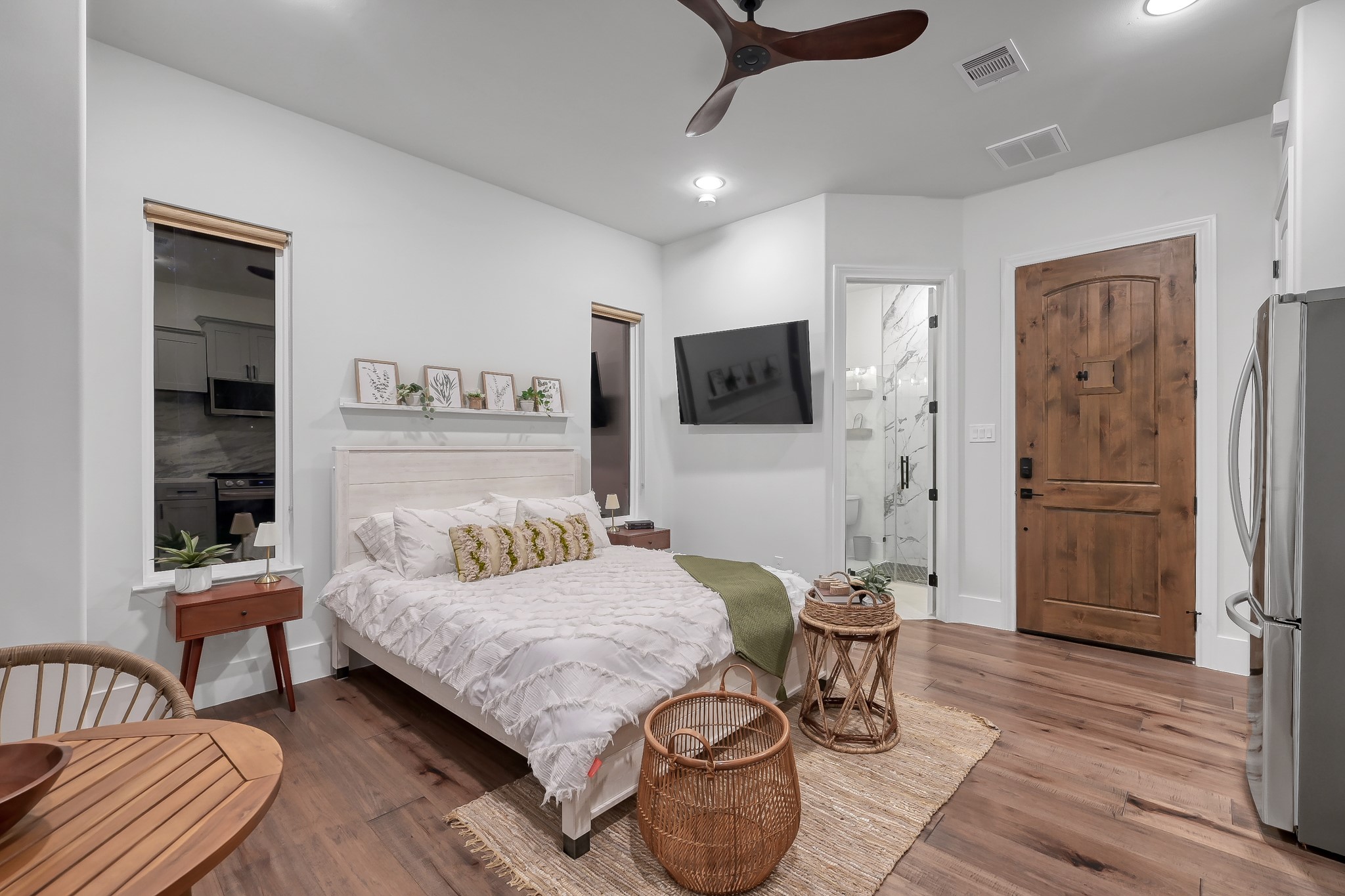 15937 Stagecoach Road Stagecoach, TX 77355 - Photo 45 of 50 a bedroom with furniture and a flat screen tv